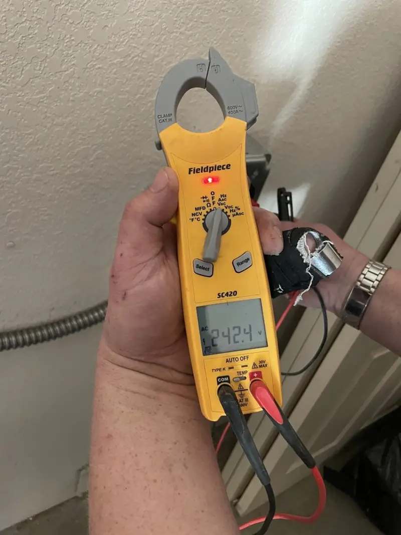 Voltage testing with clamp meter during Circuit Breaker Repair in Wesley Hills